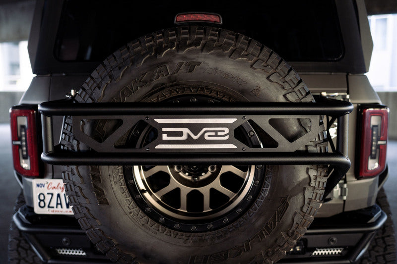DV8 Offroad 21-23 Ford Bronco Spare Tire Guard &amp; Accessory Mount - TCBR-01