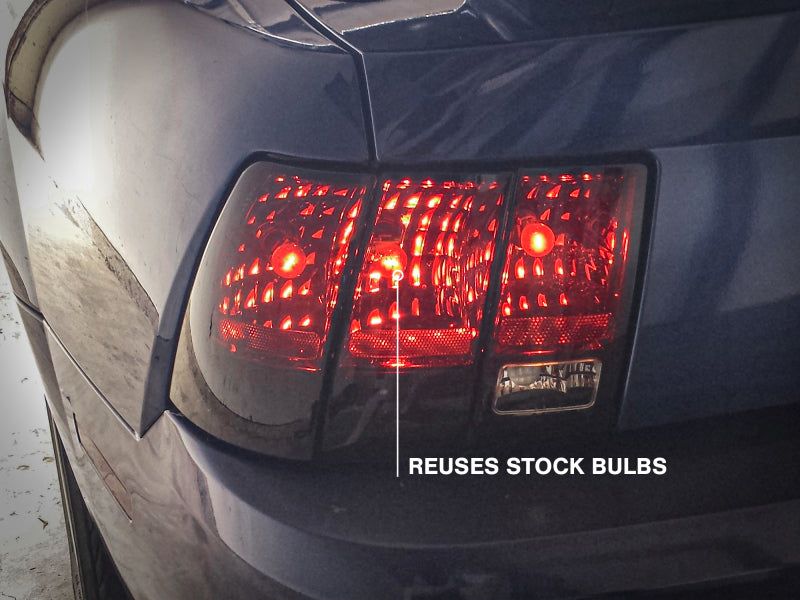 Raxiom 99-04 Ford Mustang Excluding 99-01 Cobra Tail Lights- Black Housing (Smoked Lens) - 49080