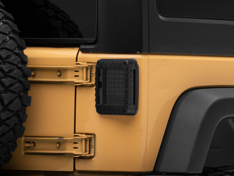 Raxiom 07-18 Jeep Wrangler JK LED Tail Lights- Black Housing (Smoked Lens) - J115435