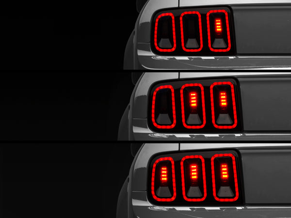 Raxiom 05-09 Ford Mustang Gen5 Tail Lights- Black Housing (Smoked Lens) - 49169 for 2005-2014 Ford Mustang - front view