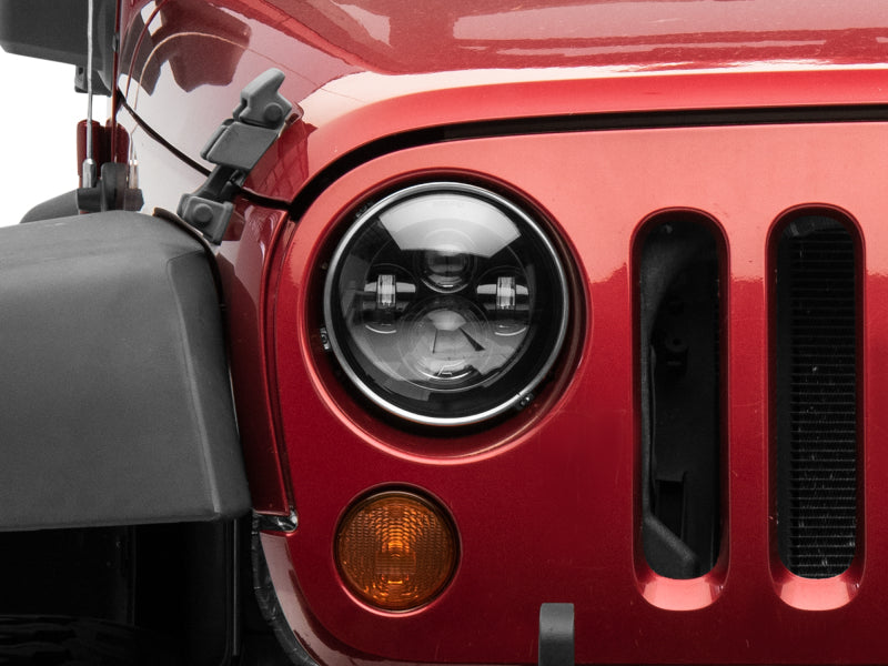 Raxiom 97-18 Jeep Wrangler TJ/JK Axial Series LED Daymaker Headlights- Black Housing (Clear Lens) - J108042