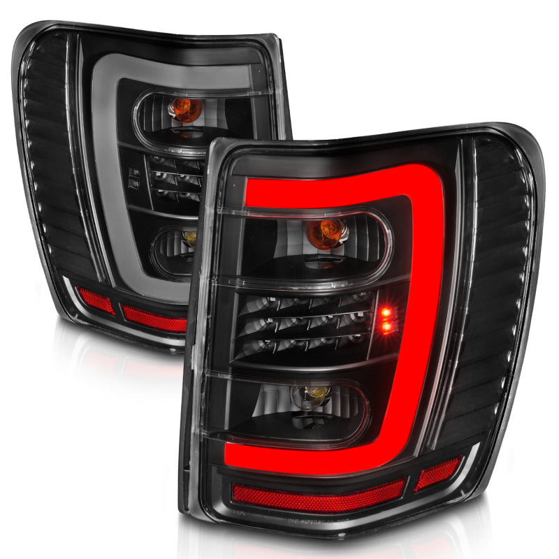 ANZO 1999-2004 Jeep Grand Cherokee LED Tail Lights w/ Light Bar Black Housing Clear Lens - 311394