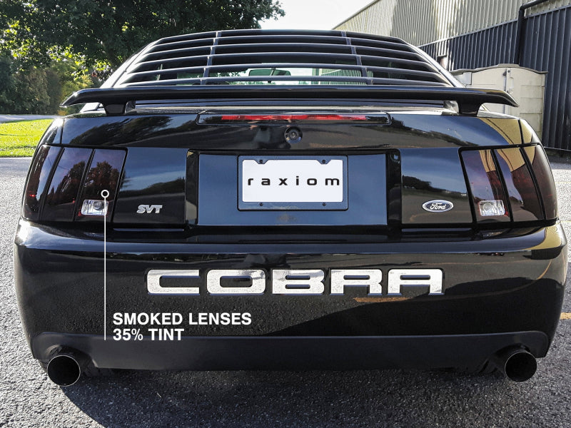 Raxiom 99-04 Ford Mustang Excluding 99-01 Cobra Tail Lights- Black Housing (Smoked Lens) - 49080